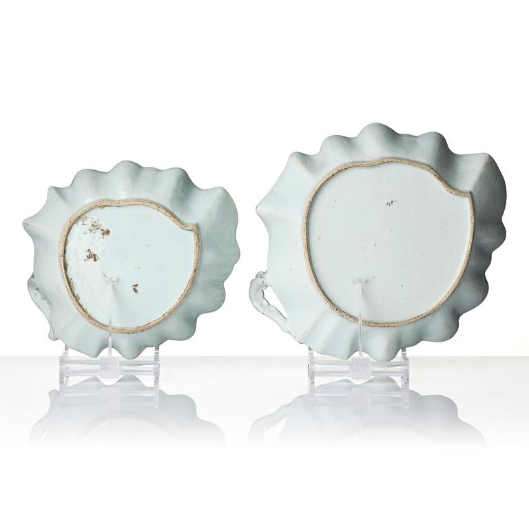 A pair of leaf shaped 'European subject' dishes, Qing dynasty, 18th century.