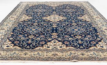 A carpet, possibly Yasd, c. 459 x 309 cm.