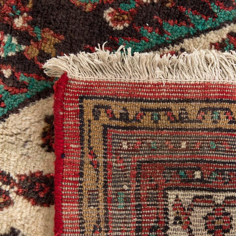 An old Dargazin carpet ca 303 x 205 cm.