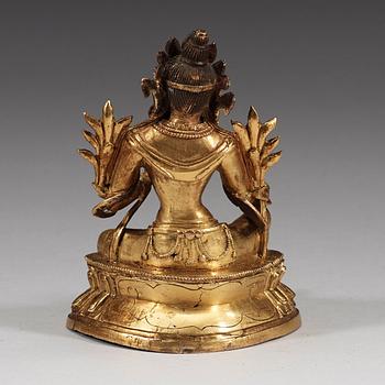 A gilt bronze figure of a seated Green Tara, Tibeto-Chinese, 18th Century.