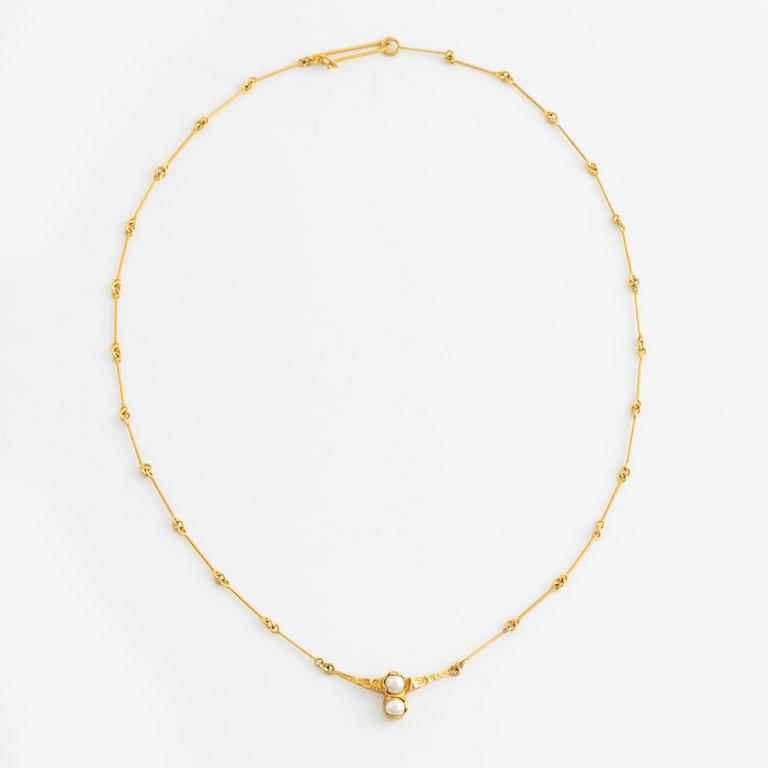 Björn Weckström, collier, "Cheek to cheek", 18K guld med en odlad pärla, Lapponia.