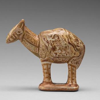 174. A SCULPTURE, A DROMEDARY, pottery with luster decor, height ca 17 cm, Persia/Iran 12th-13th century.