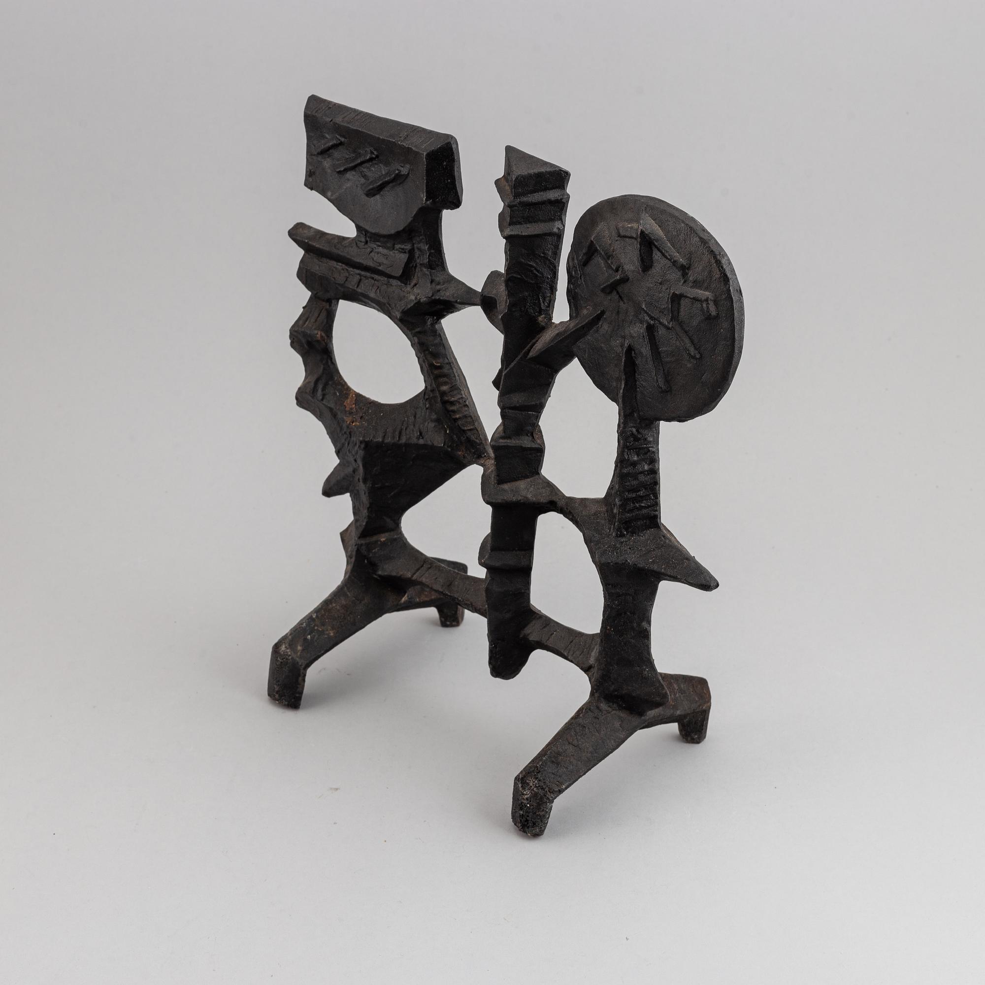 OLLE HERMANSSON, a cast iron sculpture, marked Husqvarna.