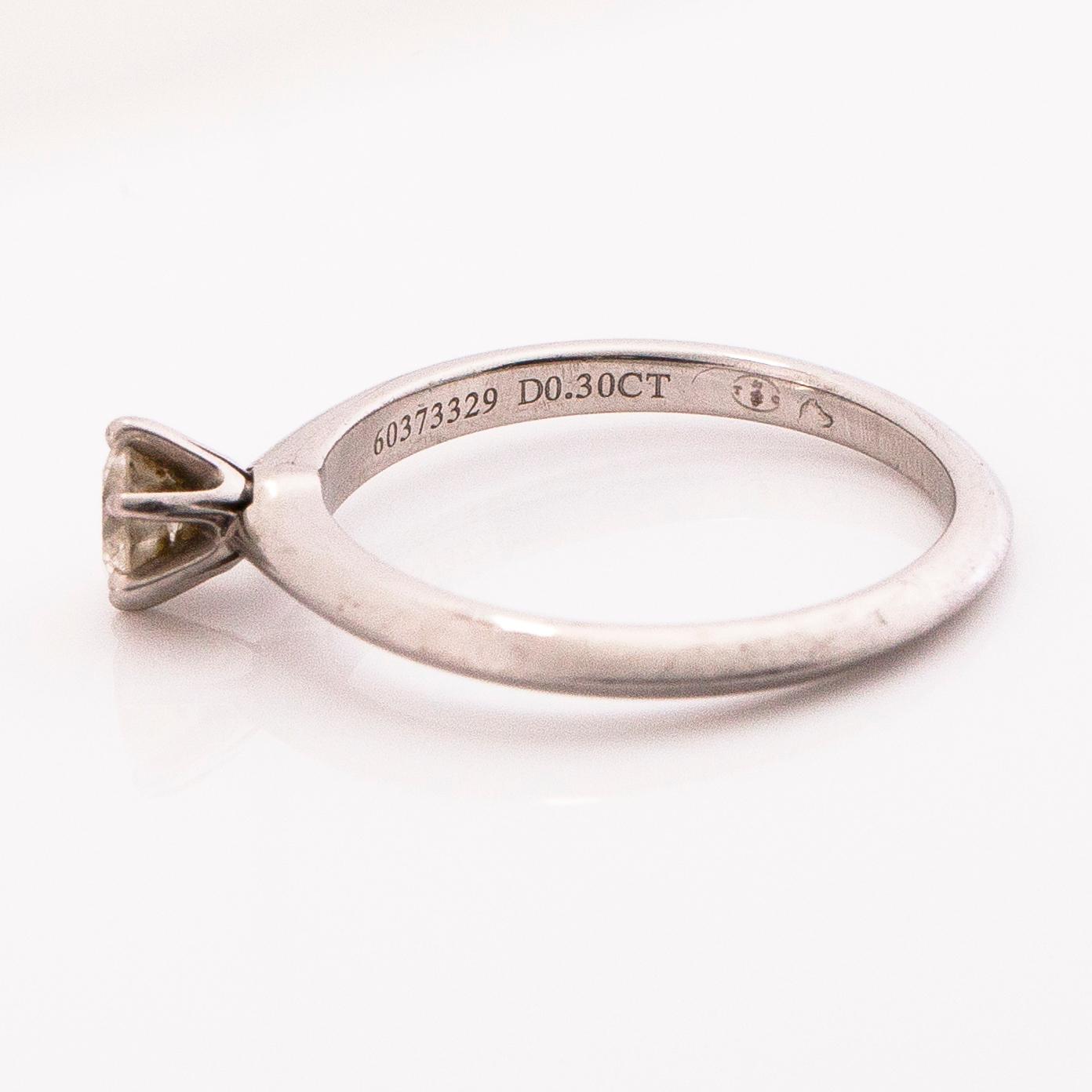 TIFFANY & CO, A platinum ring with a brilliant cut diamond ca. 0.3 ct.