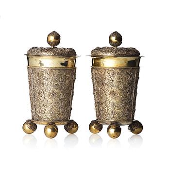 A pair of Swedish 17th century filigree and parcel-gilt silver beakers and covers, mark Rudolf Wittkopf, Stockholm 1698.