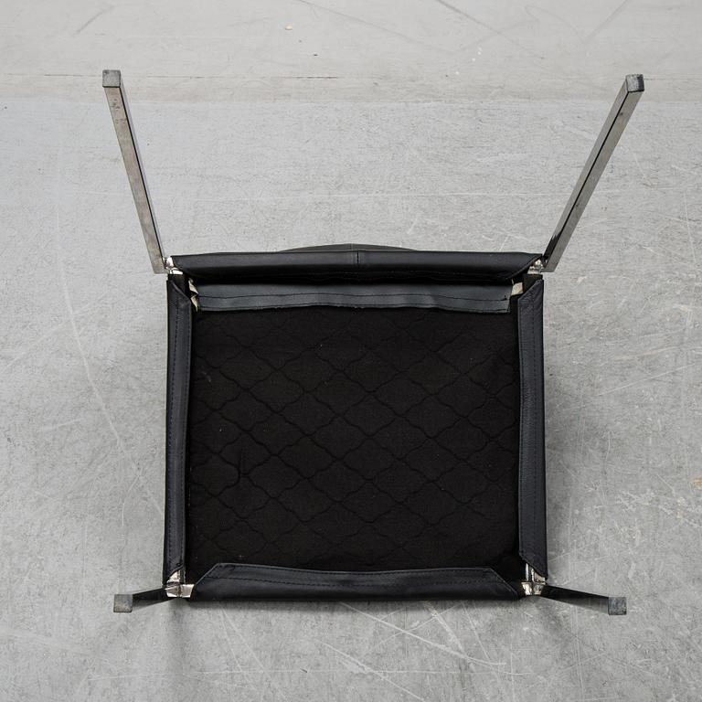 A set of eight steel and leather chairs, 21th century.