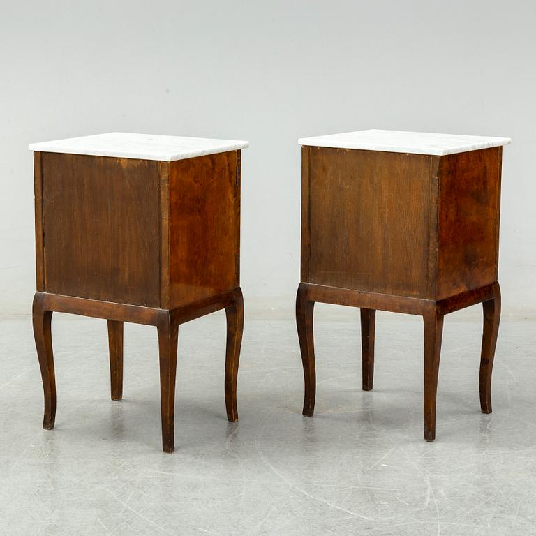 A pair of bedside tables, early 20th century.