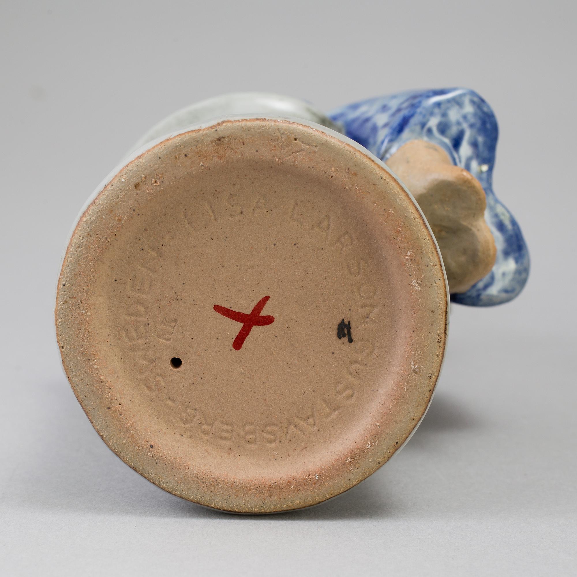 a set of three stoneware figurines by Lisa Larson for Gustavsberg.