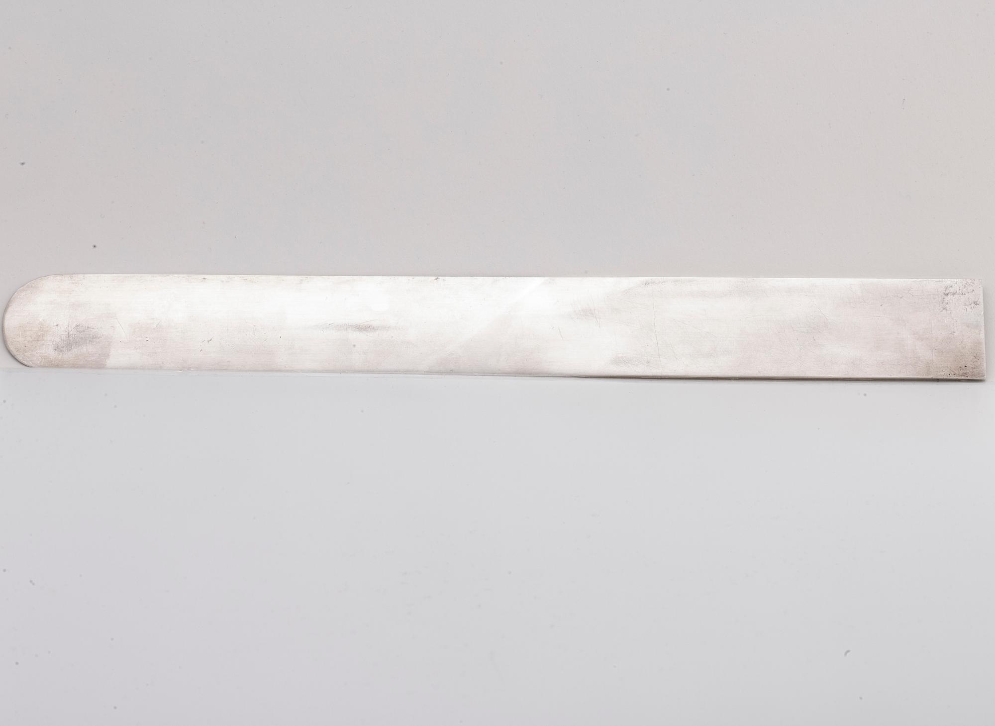 A Swedish 20th century sterling silver letter knife mark of WIWEN NILSSON Lund 1952 (?), total weight  ca 210 gr.