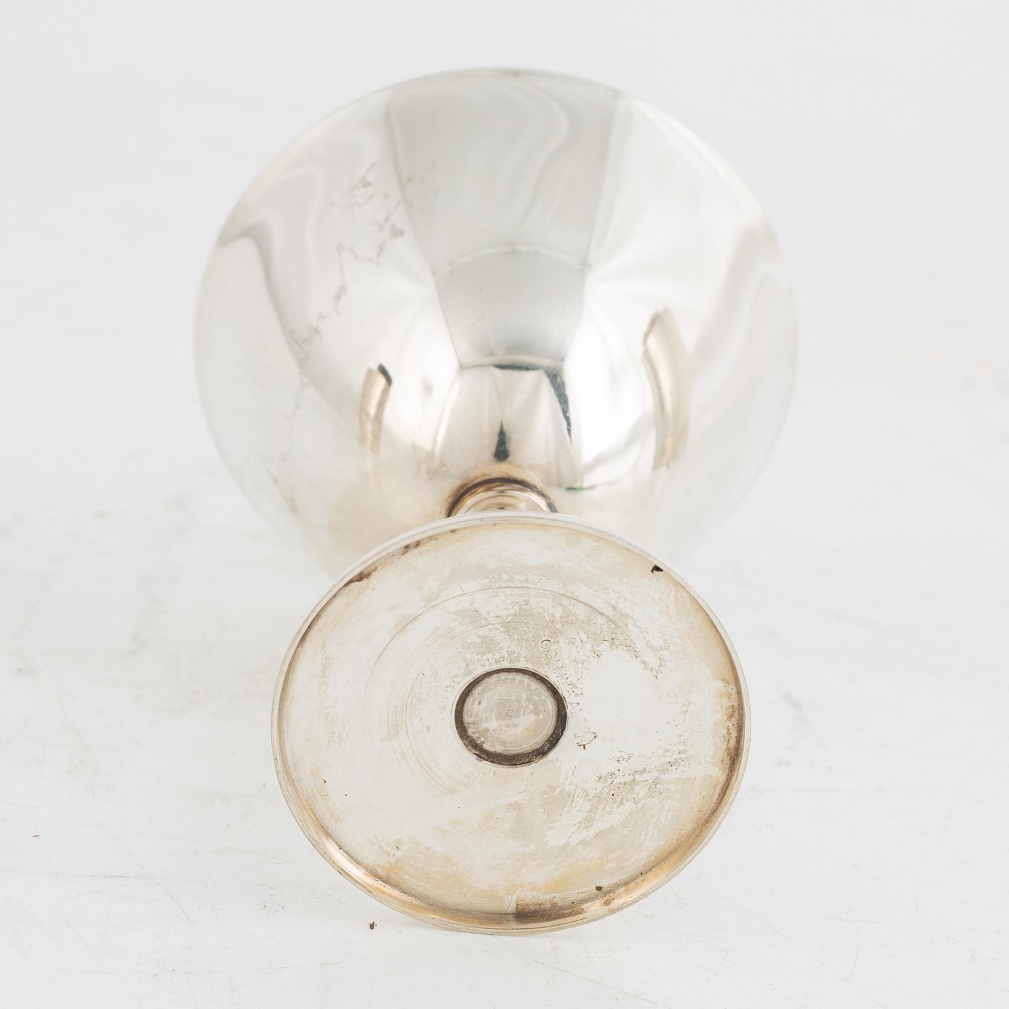 Folke Arström, eight silver plate cocktail glasses and a shaker, GAB.