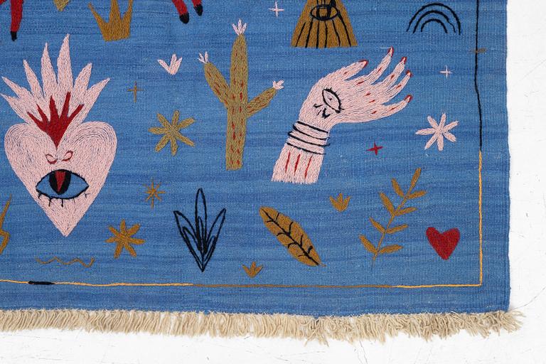 A hand-embroidered Kelim rug, 185 x 124 cm.