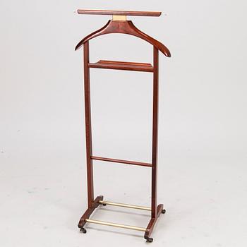An Italian Fratelli Reguitti valet stand from the latter half of 20th century.