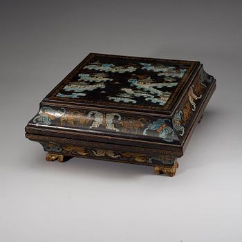 A black lacquer box and cover with a nine-piece cabaret, Qing dynasty, 19th Century.