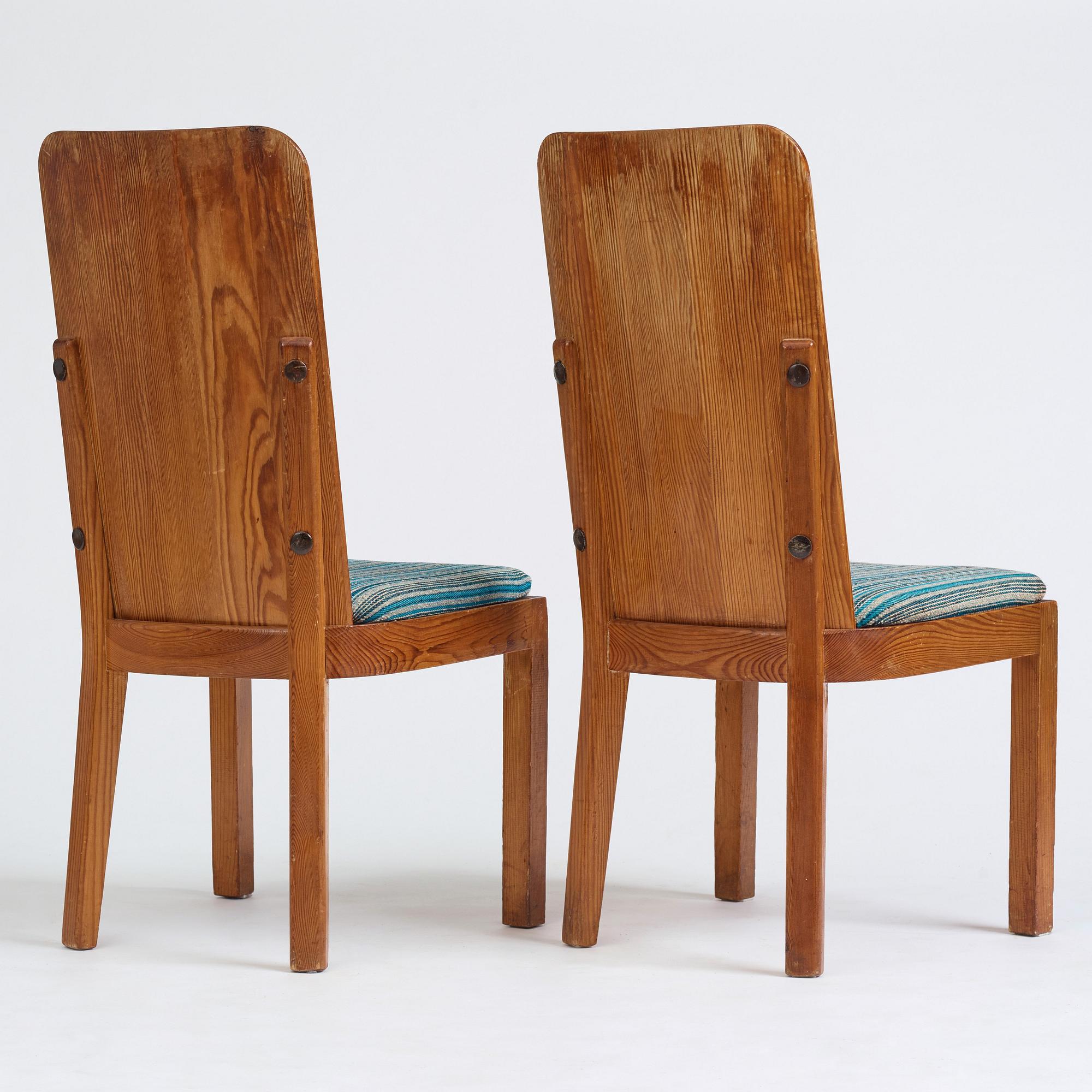 Axel Einar Hjorth, a pair of stained pine "Lovö" chairs, Nordiska Kompaniet, Sweden 1930's.
