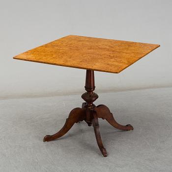 A 19th century tilt top table.