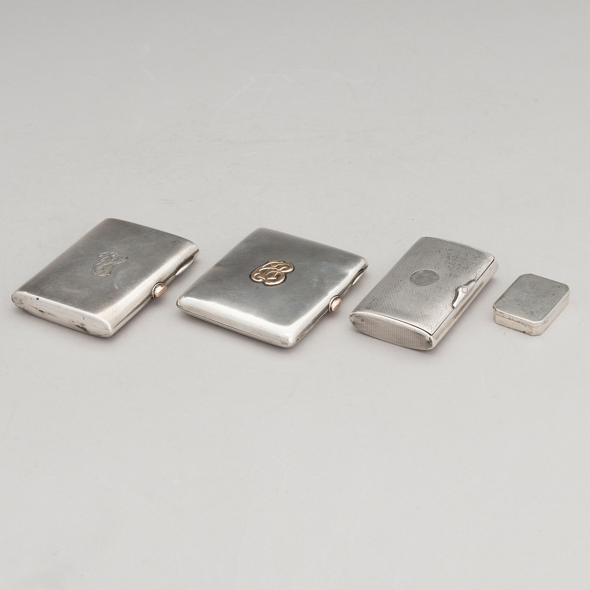 Three silver cigarette cases and a silver pillbox, marked in Finland and Germany, first half of the 20th Century.