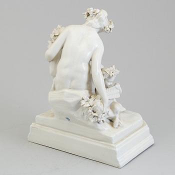 A white glazed figure group of fawns, Neapellike mark, circa 1900. After a scupture by CLODION, Claude MICHEL, 1738-1814.