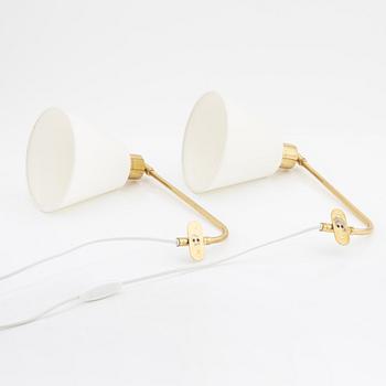 Josef Frank, a pair of model '2226' brass wall lights, Firma Svenskt Tenn.