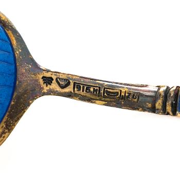 Tillander, an 8-piece set of enamelled and gilt sterling silver coffee spoons, Helsinki 1953. In original box.