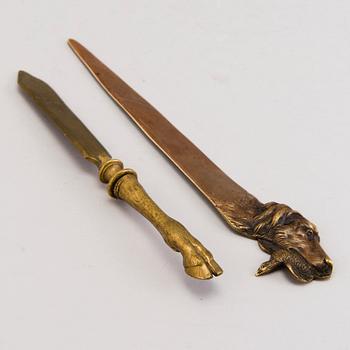 TWO PAPERKNIVES, bronze, possibly Russian.