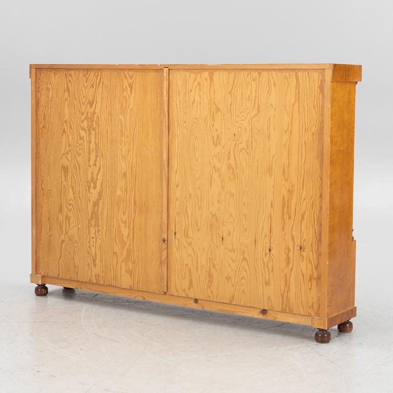 An Empire style bookcase, first half of the 20th century.