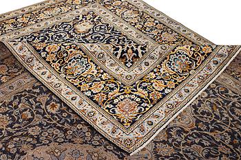 A Kashan carpet, c. 383 x 310 cm.