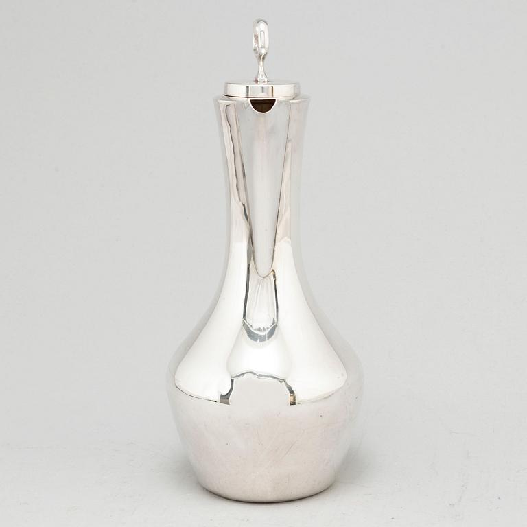 A silver claret jug from MGAB, Uppsala, 1967.