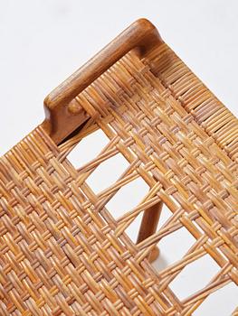 Hans J. Wegner, a foldable easy chair model 512, Johannes Hansen, Copenhagen, 1950s-60s.