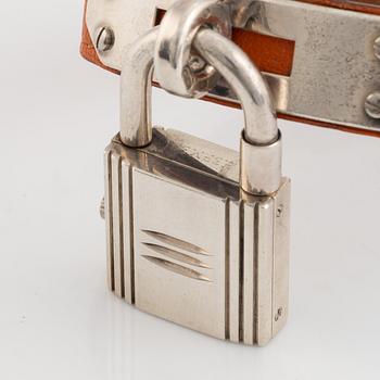 Hermès, Kelly Lock, "Silver Case", wristwatch, 20 x 20 (37,5) mm.