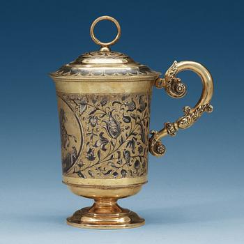 A Russian 19th century silver-gilt and niello cup and cover, un identified makers mark Moscow 1850's.