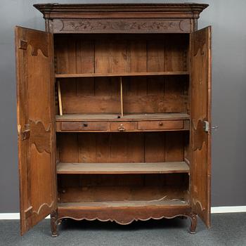 A french carved wooden cabinet, around 1900.