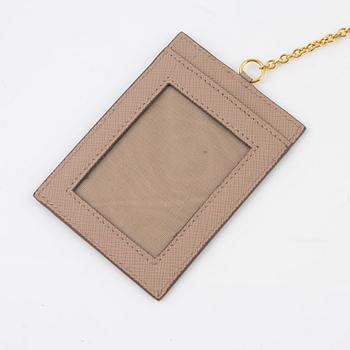 Prada, a brown saffiano wallet.
