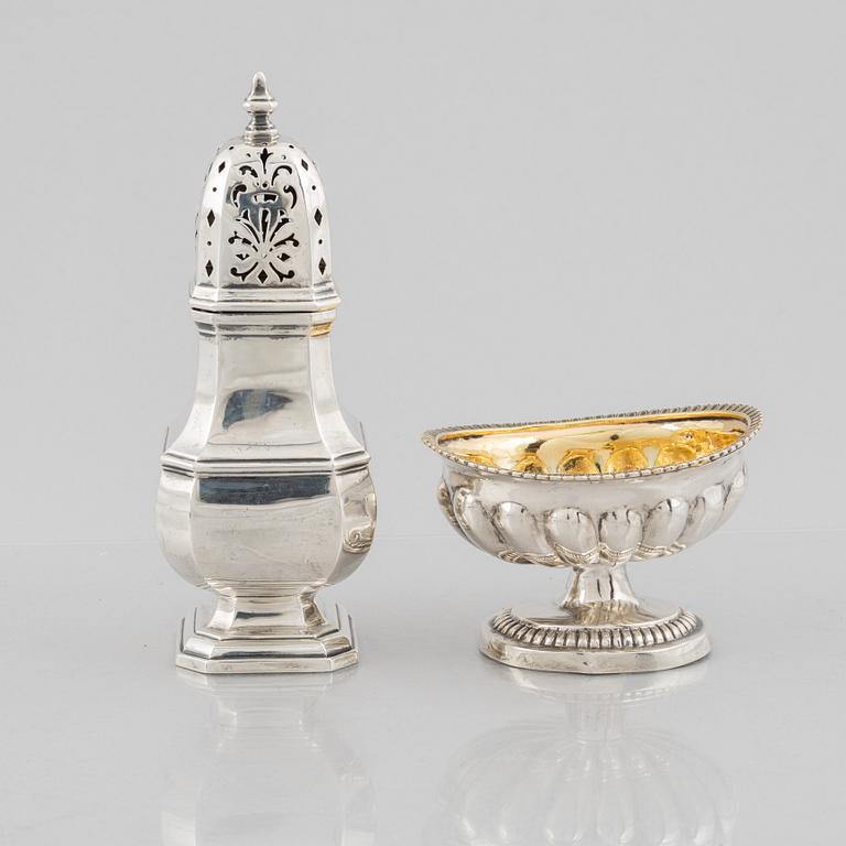 A silver sugar caster from E. S. Barnsley & Co, Birmingham,  1914, and a silver salt cellar with indistinct marks.