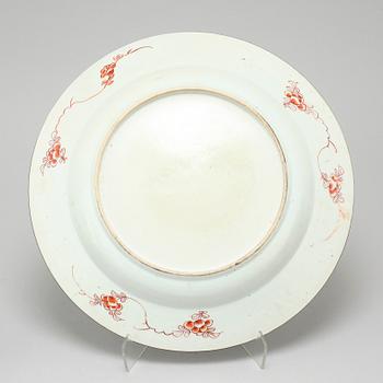 A pair of famille verte plates and a serving dish, Qing dynasty, 18th century.