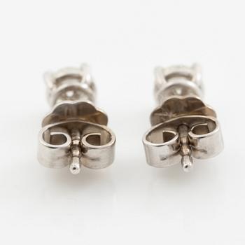 Earrings, a pair, 18K white gold with brilliant-cut diamonds totalling 0.60 ct.