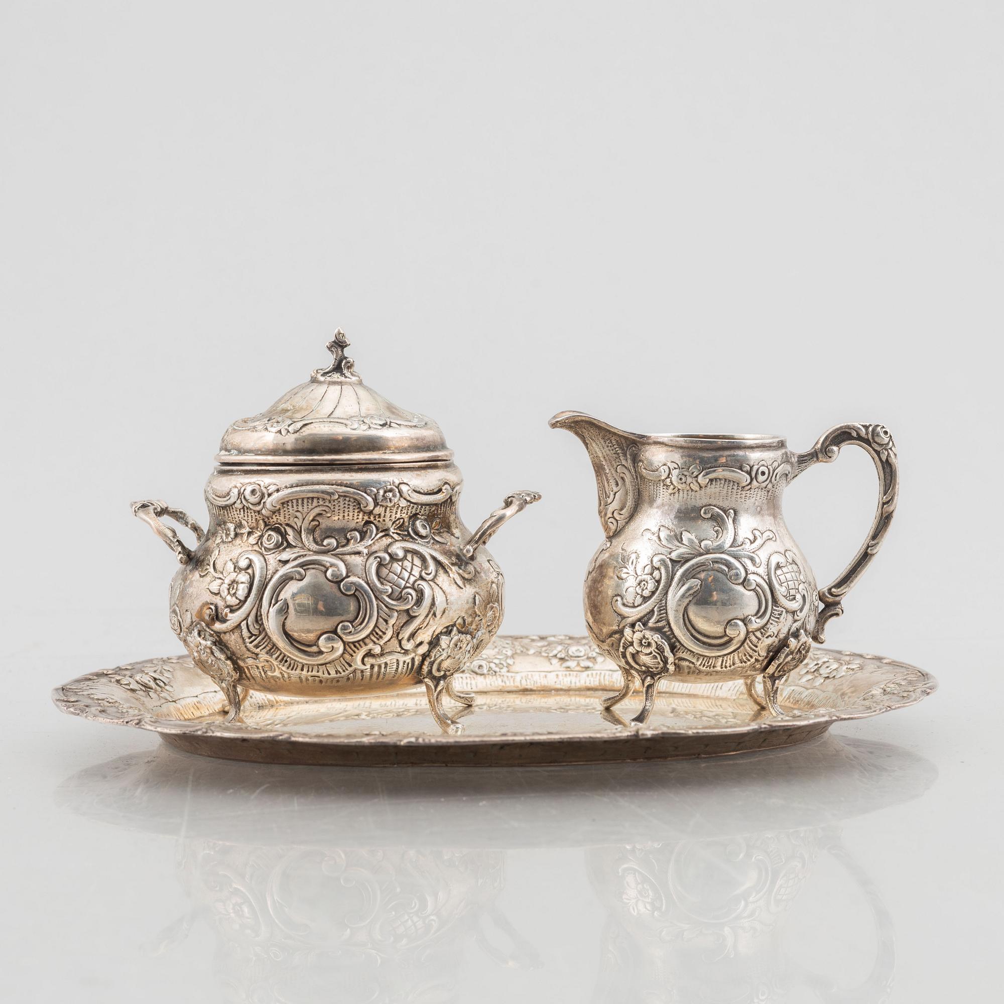 A Swedish silver sugarbowl, creamer and tray, mark of JL Hultman AB, Stockholm 1951-1952.