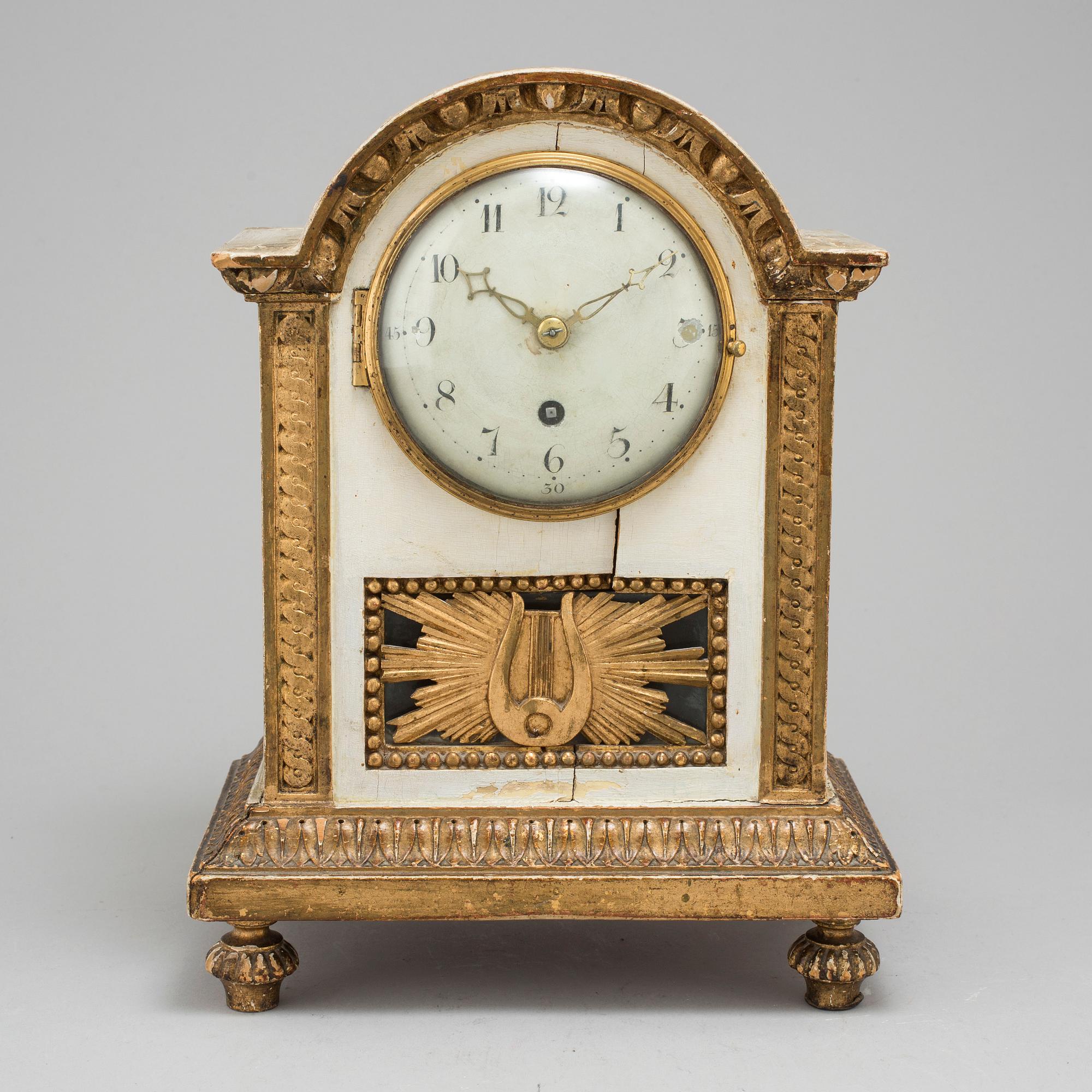 A Swedish late gustavian table clock, ca 1800.