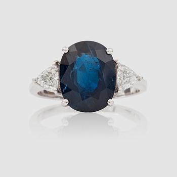 A natural untreated Burmese sapphire 5.25 cts and trilliant-cut diamond, 0.45 cts in total, ring.