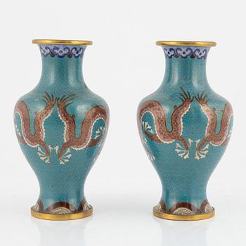 A silk clad box with two cloisonné vases, China early 20th Century.