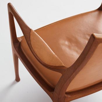 Hans Asplund, a walnut and leather easy chair, Nordiska Kompaniet, ca 1955, for the Nordiska Kompaniet beauty salon.