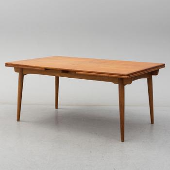 HANS J WEGNER, a model 'AT312' teak and oak dining table from Andreas Tuck, Denmark.