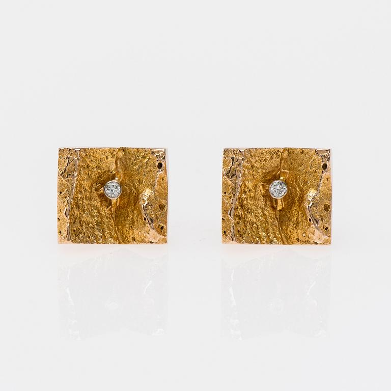 MANSCHETTKNAPPAR,"Gullies" Björn Weckström, Lapponia 1965. 14K guld, briljantslipade diamanter. Vikt ca 13,1 g.