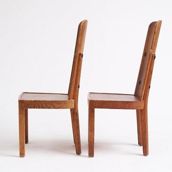 Axel Einar Hjorth, a pair of stained pine 'Lovö' chairs, Nordiska Kompaniet, Sweden 1930s.