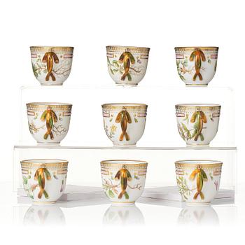 A set of nine Royal Copenhagen 'Flora Danica' cups with saucers, Denmark, 20th century.