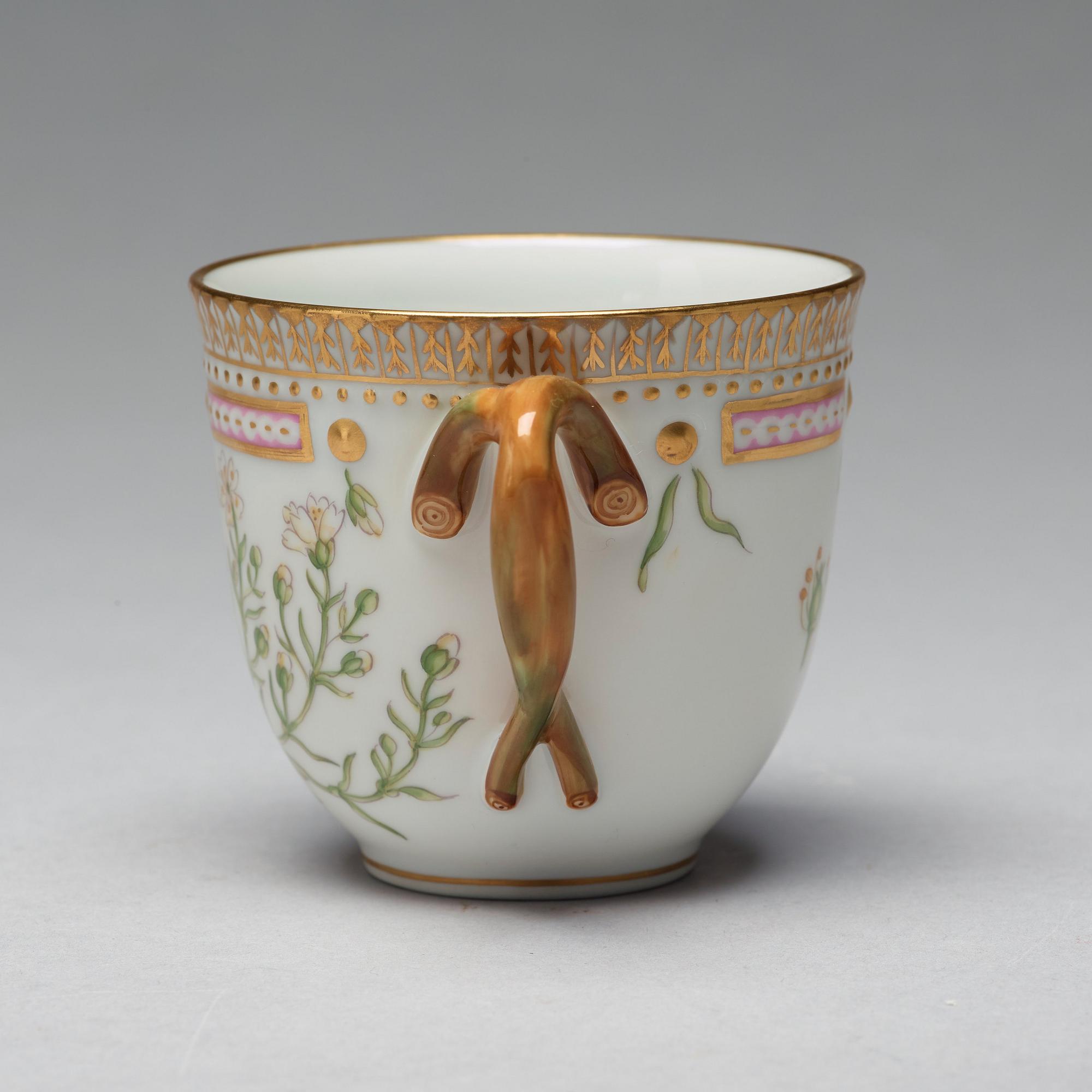 A set of four Royal Copenhagen 'Flora Danica' coffee cups with saucers, Denmark, 20th Century.