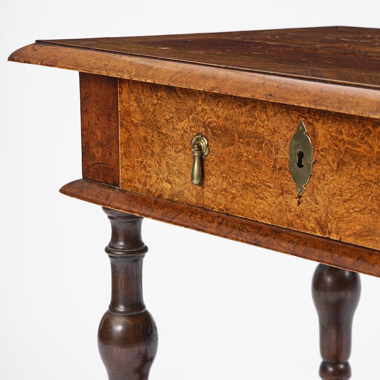 A Swedish late baroque burr-alder table, Stockholm, first part 18th century.