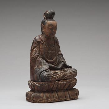 A lacquered and gilded wooden figure of Guanyin, Ming dynasty (1368-1664).