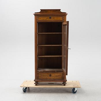 A walnut veneered cabinet, second half of the 19th Century.