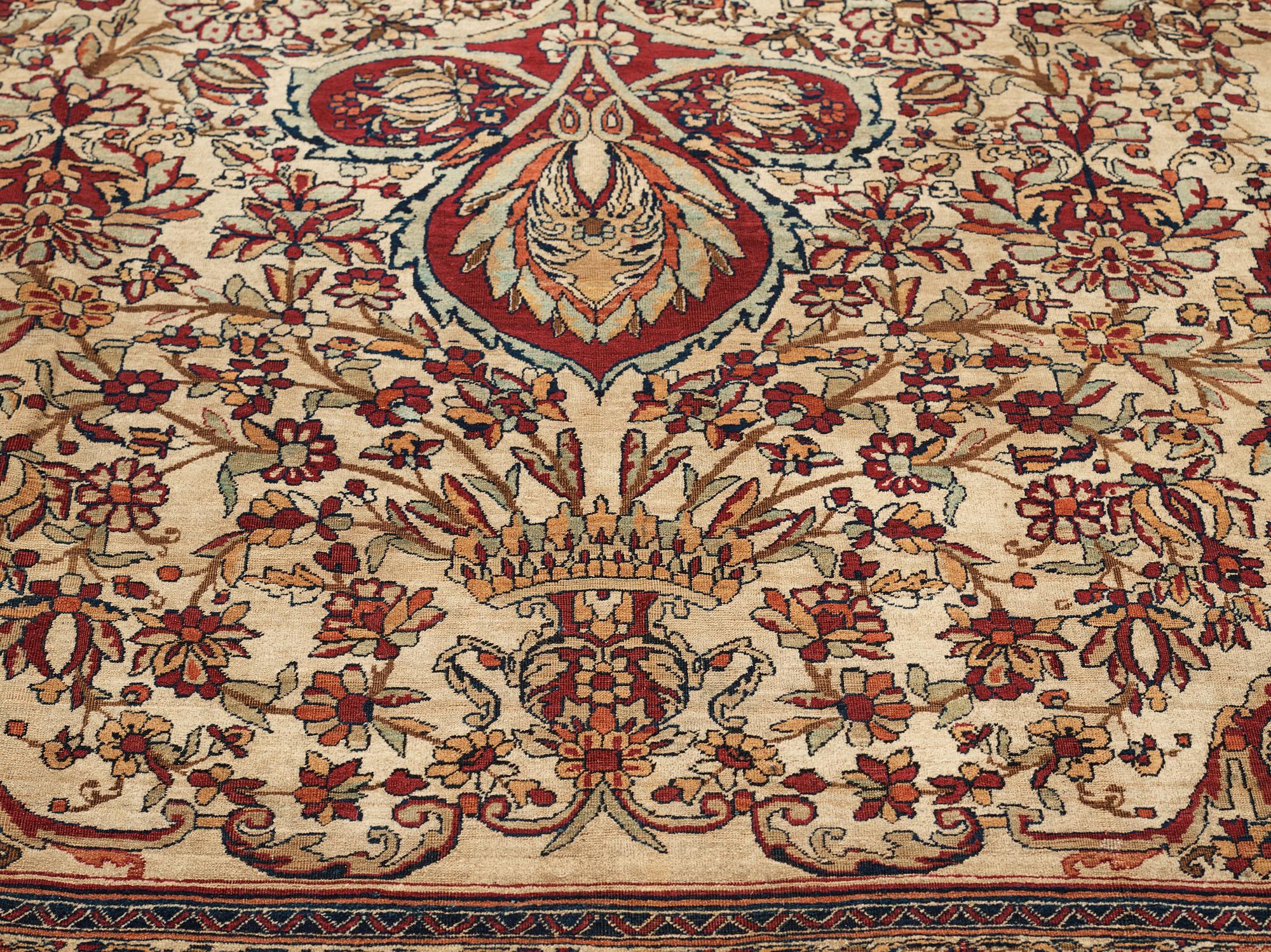 A carpet, an antique Kerman Laver, ca 677-688,5 x 510,5-526 cm.