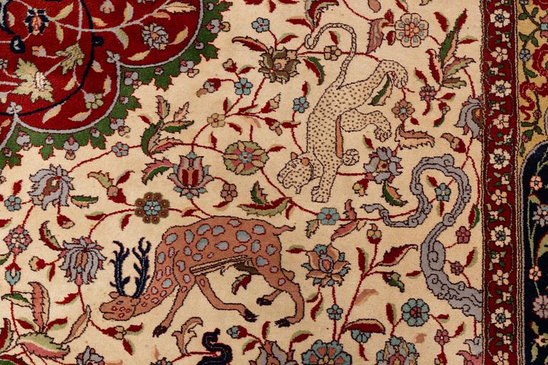 A semi-antique pictoral carpet from Northern india, ca 396 x 293 cm.
